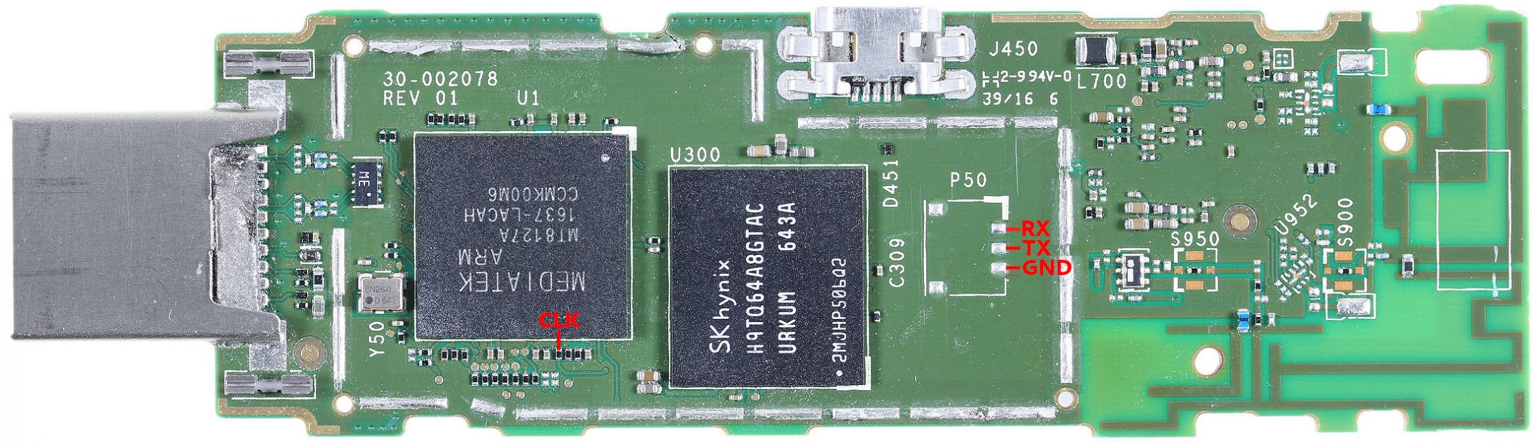Fire TV Stick board with CLK, RX, TX and GND marked